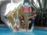 The three ladies terrified in the jaws of death.  (Or just playing around on the Paradise dragon water-slide.)