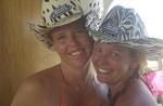 Jean and Cherie in their signature animal print cowboy hats.