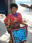 A Kuna Yala displaying one of her "molas."  They take pride in their art which is sought after all over the globe.