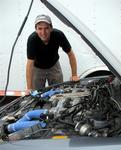 Greg examines the engine of his 400 HP Nissan 300ZX.