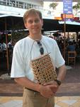 Tinus isn't too proud to carry a bottle-cap purse.