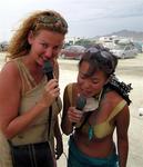 Cherie and Grace serenade nearby camps during a sandstorm.