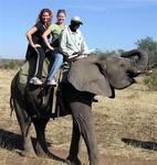 Cherie and Kristi on an Elephant Safari in Zimbabwe.