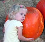 I think Grace wants this pumpkin!