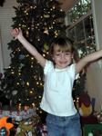 Ellie jumps for joy at all the Christmas gifts she got!