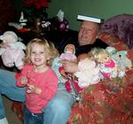 Dad, surrounded by dolls. *Photo by Joanne. 