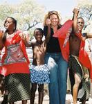 Cherie doing the Sibhaca dance with the Swazis in Swaziland. *Photo by Renee.