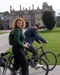 Cherie and Enrico ride past the Muckross house, Killarney.