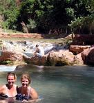 Cherie and Jean kick off their hiking gear and take a dip in the cool pristine waters.