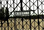 The gate at Dachau says: Arbeit Macht Frei, which translates to "Work will set you free."