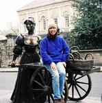 Renee takes a ride on Molly Malone's cart.