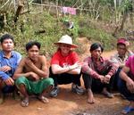 Cherie hanging out with some of the men from the Karen hill-tribe in Northern Thailand.