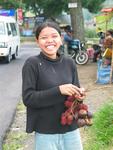 The happy funky-fruit seller. *Photo by Margaret.
