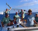 A happy crew charters its yachts from BVI Yacht Charters.