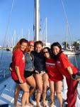 The ladies prepare to rock the boat as they sail from Ibiza to Formentera.