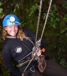 Cherie abseiling into one of Waitomo's glow worm infested caves.