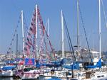 Patriotic yachts gather for the Newport Beach Old Glory Boat Parade on July 4th.