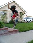 Tyler flying on his skateboard at 11-years old.