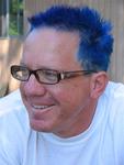 Justin dyes his hair bright blue so he's easy to spot during the race.