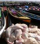 Boats at the market in Inle Lake. *Photo by Jean Leitner.