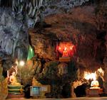 At each bend of the cave there is a new shrine to the Buddha. 