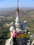 Jean surrounded by the dramatic temple tops of Taung Kalat.