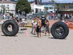 In the tire flip, massive tires weighing 650-pounds are flipped 5 times (end over end) down the beach.