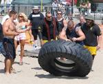 What do you want to do this weekend?  Watch big guys flip tires across the beach?