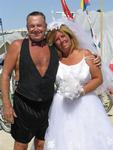 After over a decade of dating, Rennie and Anne tied the knot.  We re-created the ceremony at Burning Man with silk boxers for the groom and a thrift-store bought wedding dress for the bride.