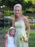Kate, the flower girl with her mom Debbie. *Photo by Cherie Sogsti.