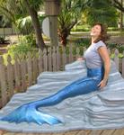 Kristi can swim so much faster now that she's a mermaid!