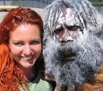 Cherie with an Australian Aborigine.  Body painting is an important Aboriginal ceremonial custom; the white ochre "paint" is derived from kaolin.