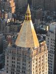 Golden NY rooftops gleam in the sun.  