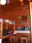 The cabin decorated with 36 balloons.