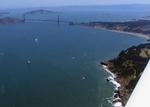 Why is the Golden Gate Bridge brick colored?
