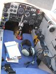 The cockpit of the Long-EZ.  Pilots say the aircraft is manuvered by a side-stick controller; I call it a joystick.