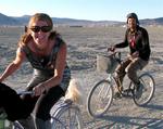 Jean and Greg race across the playa. *Photo by Brian Delaney.