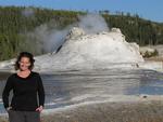 Cherie by a geyser about to erupt in Yellowstone National Park, Wyoming.