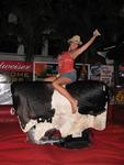 Karem rides the mechanical bull at Cowboy Bills.